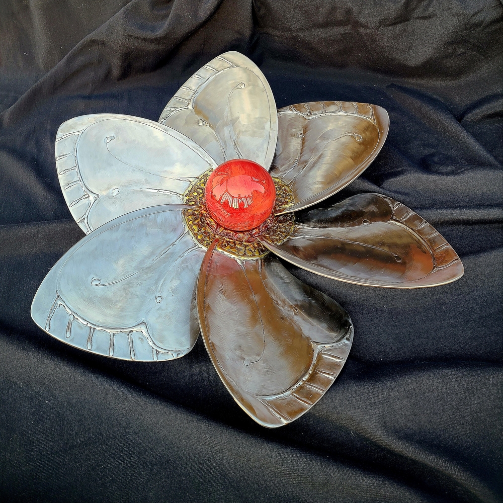 Elegant Metallic Flower Sculpture with Red Center